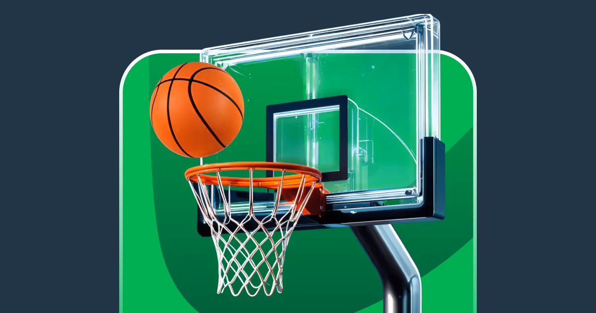 Basketball going through a hoop and backboard